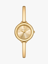 michael kors izzy three hand gold tone watch
