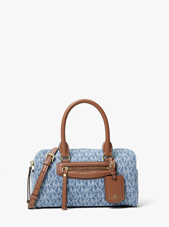 حقيبة كروس جيت سيت ترافيل صغيرة جدًا من قماش الدنيم michael kors حقيبة كروس جيت سيت ترافيل صغيرة جدًا من قماش الدنيم