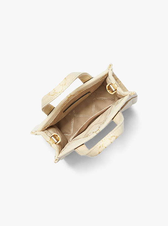 حقيبة كروس جيجي صغيرة للغاية بشعار إمباير ميتاليك جاكار michael kors حقيبة كروس جيجي صغيرة للغاية بشعار إمباير ميتاليك جاكار