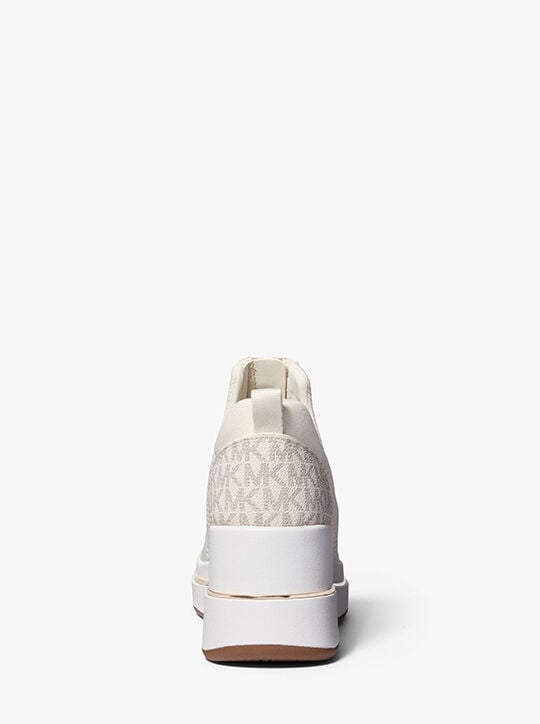 michael kors emmy mesh zip up wedge trainer