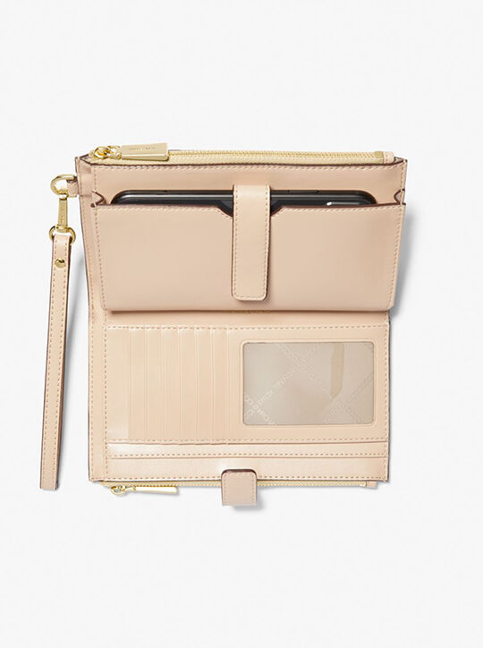 Jet Set Large Logo Embossed Metallic Smartphone Wristlet michael kors jet set large logo embossed metallic smartphone wristlet