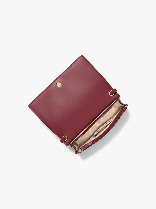 حقيبة جيت سيت متوسطة الحجم من الجلد المحبب michael kors حقيبة جيت سيت متوسطة الحجم من الجلد المحبب