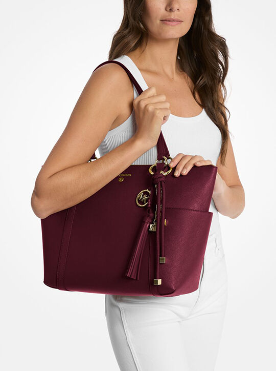 michael kors gold tone and cord bag charm