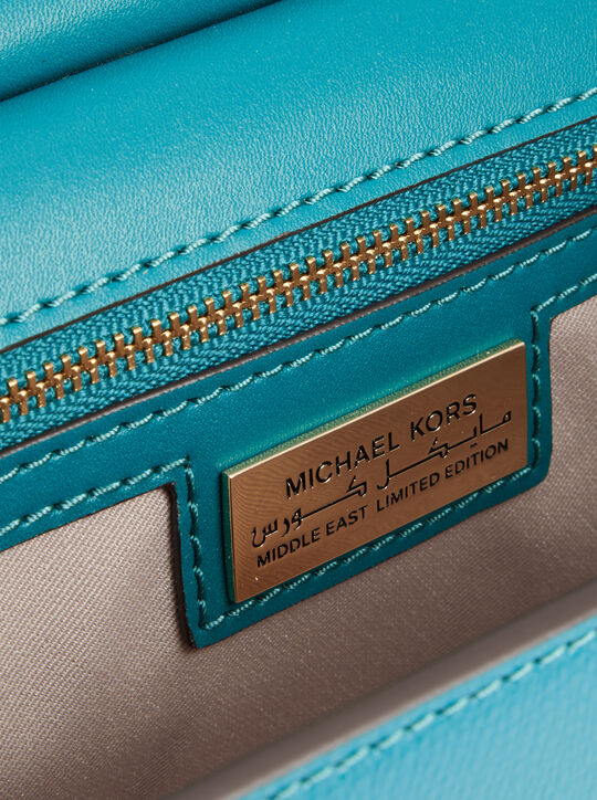 michael kors tribeca extra small signature logo convertible crossbody bag